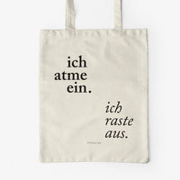 Jutebeutel von typealive in creme mit dem Aufdruck „Ich atme ein. - Ich raste aus.“