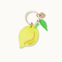 Schlüsselanhänger von Vivi, elegantes Accessoire mit glänzendem Metall-Design, auf weißem Hintergrund fotografiert.