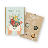 Mini Geschenk-Box von blossombs für drinnen und draußen, stilvolle Verpackung mit Blumenmotiven, perfekt als Geschenk.