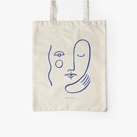 Jutebeutel von typealive in creme mit dem Aufdruck „Faces“