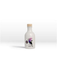 Bunte Flasche Heimat Gin "Vogelfrei Color" alkoholfrei mit buntem Etikett, ideal für Getränke und Genuss.
