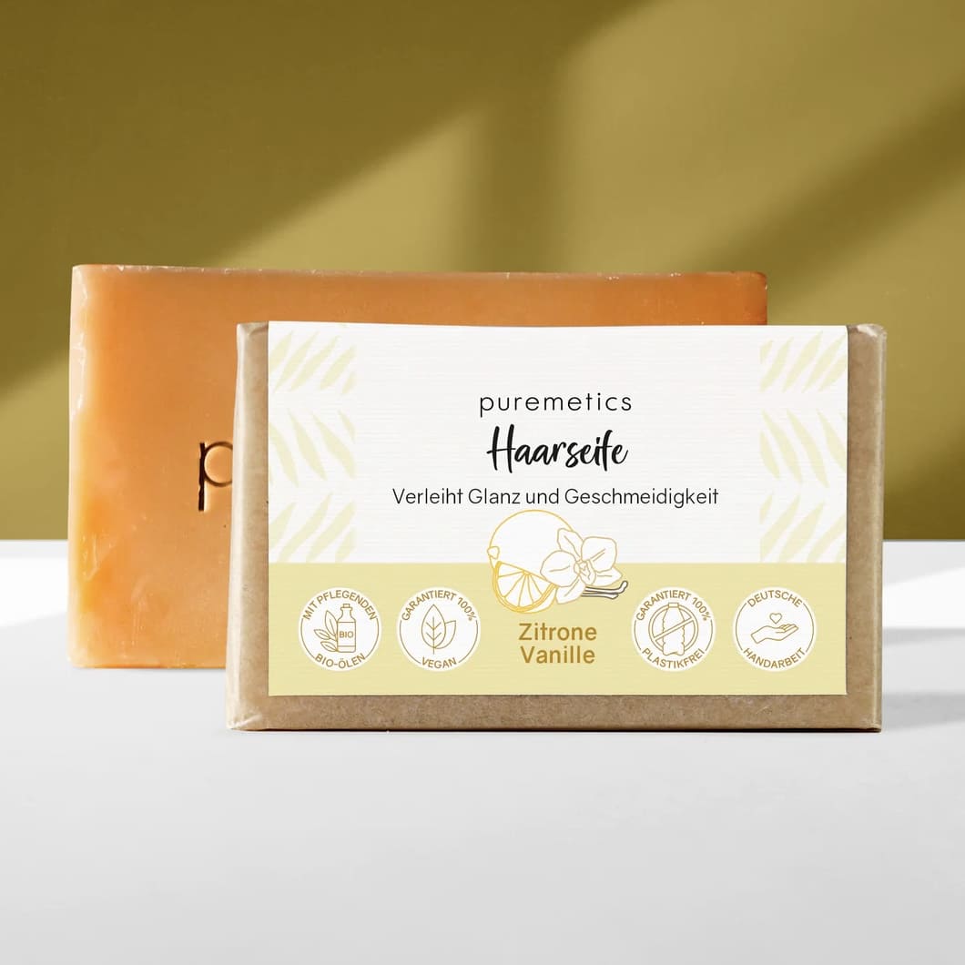 Haarseife von Puremetics, natürliche Beauty- und Pflegeprodukt, zeigt die Seife in einer weißen Verpackung mit grüner Beschriftung