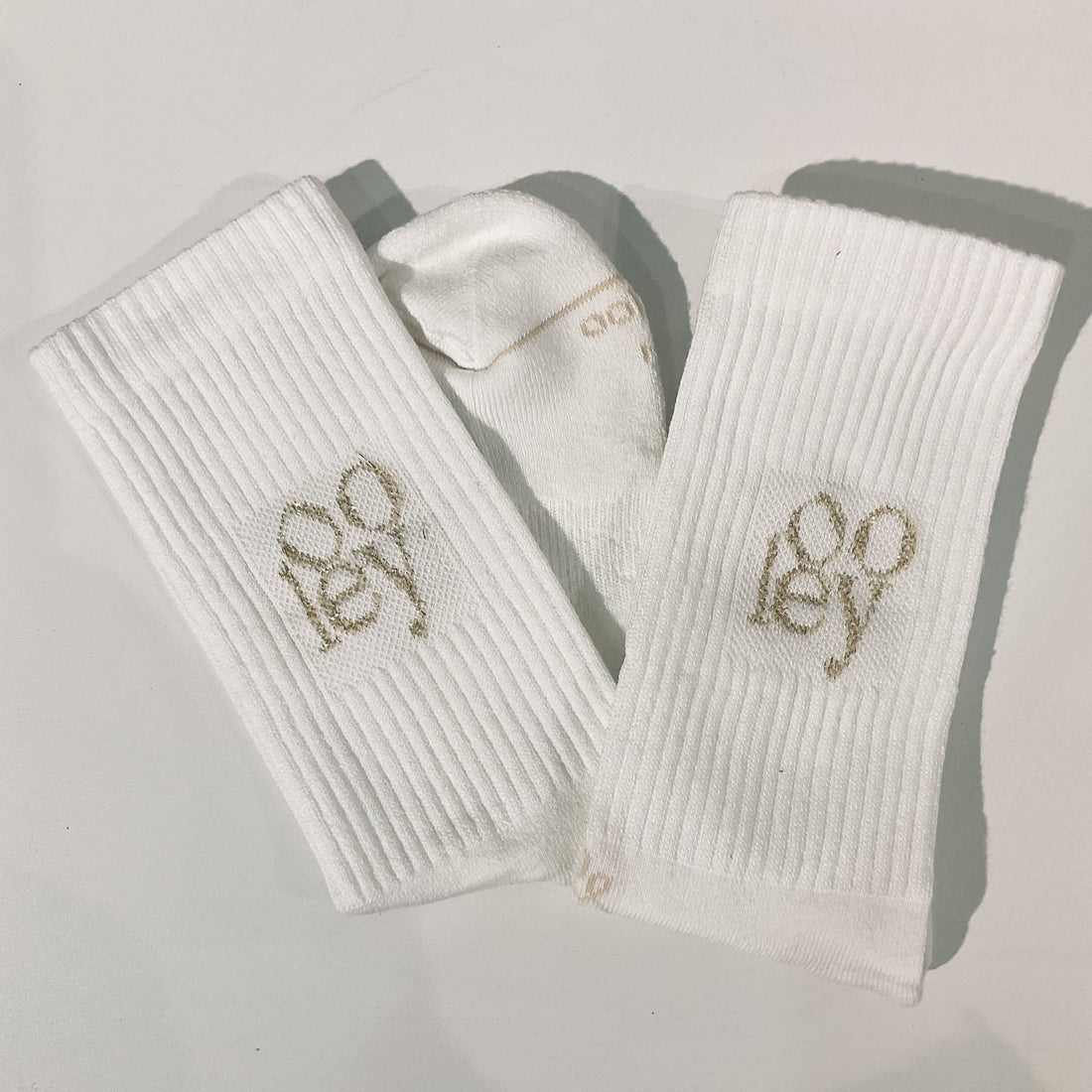 Socken mit Aufschrift, Ooley