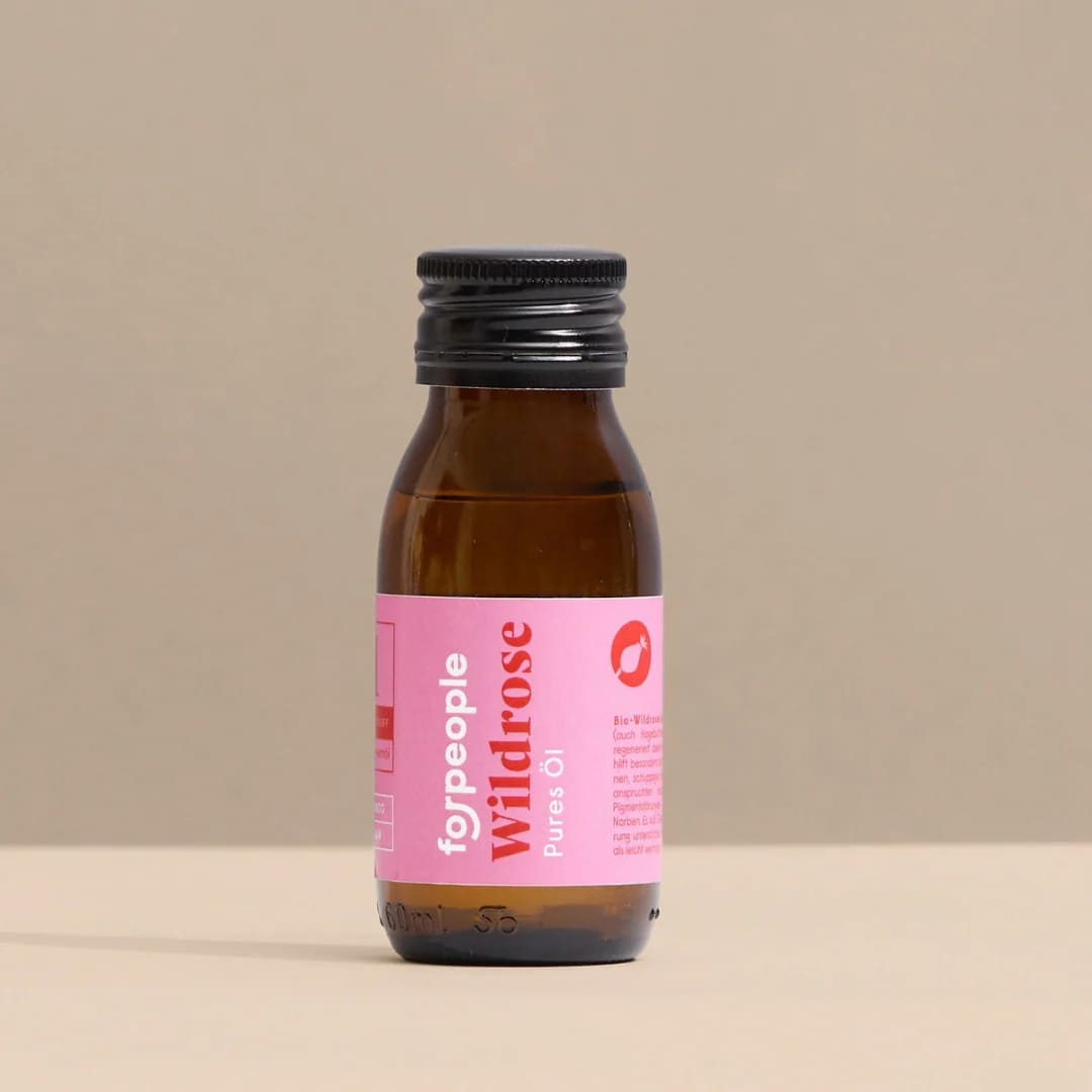 Natürliches Wildrosenkernöl von 4 people who care, in einer eleganten Flasche, ideal für Beauty- und Pflegeanwendungen