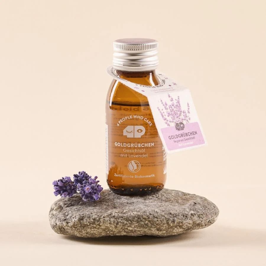 Lavendel-Gesichtsöl von 4 People Who Care, flüssiges Schönheits- und Pflegeprodukt in einer eleganten Flasche.