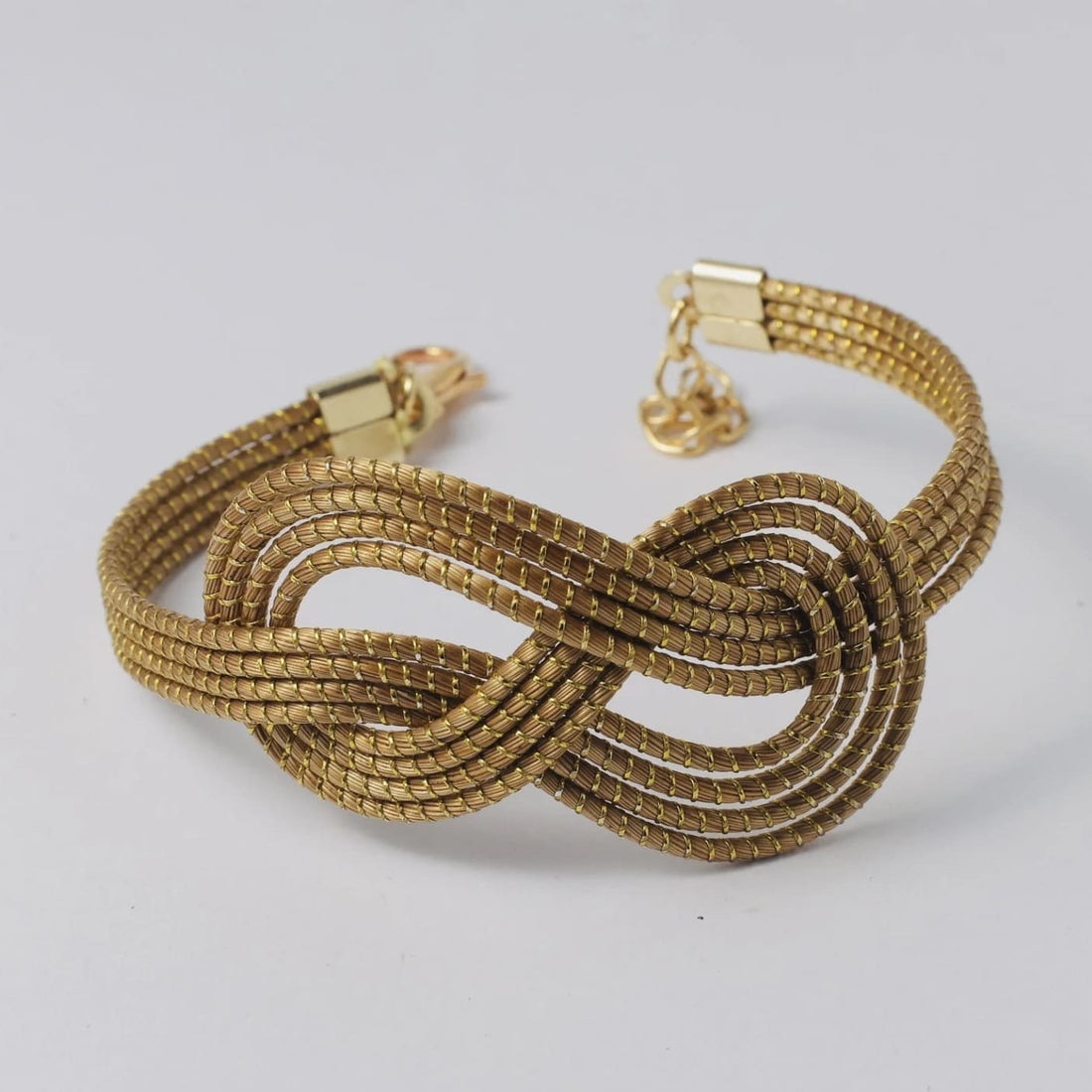 Capido Armreif Graviola aus Goldgras mit Knoten und verstellbarer Kette