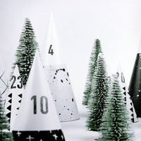 Adventskalender von Typealive aus Papeterie mit bunten, festlichen Designs und 24 Türchen zum Öffnen.