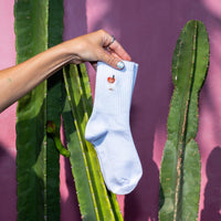Bunte Socken mit Aperol-Motiv von Made By Nami, detailreiche Mustersocke aus Bekleidung, bequem und stylish.