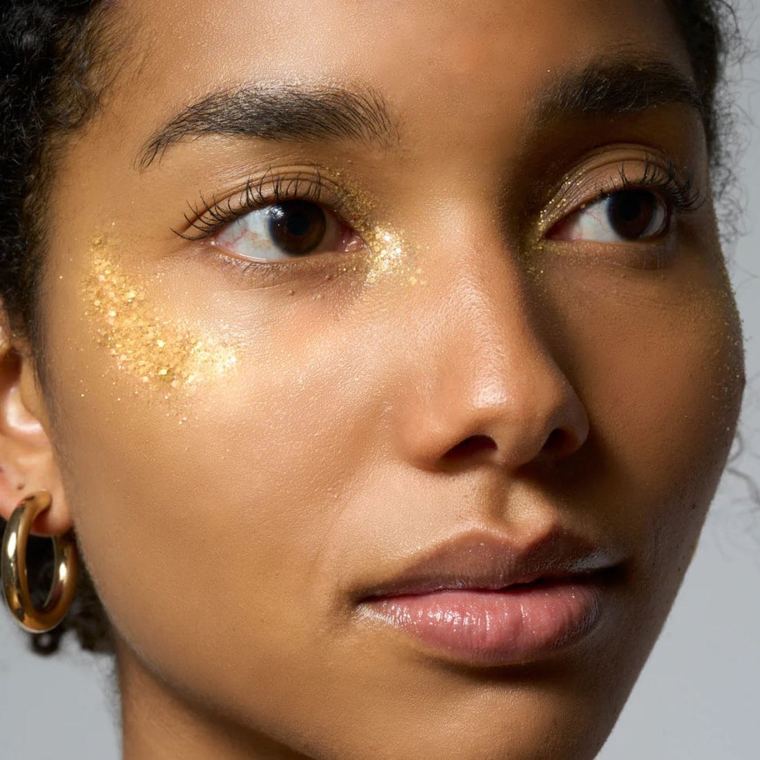 Goldene Glitzer-Bio 5g von Birkenspanner, schön gestaltete Verpackung, ideal für Beauty & Pflege Anwendungen.