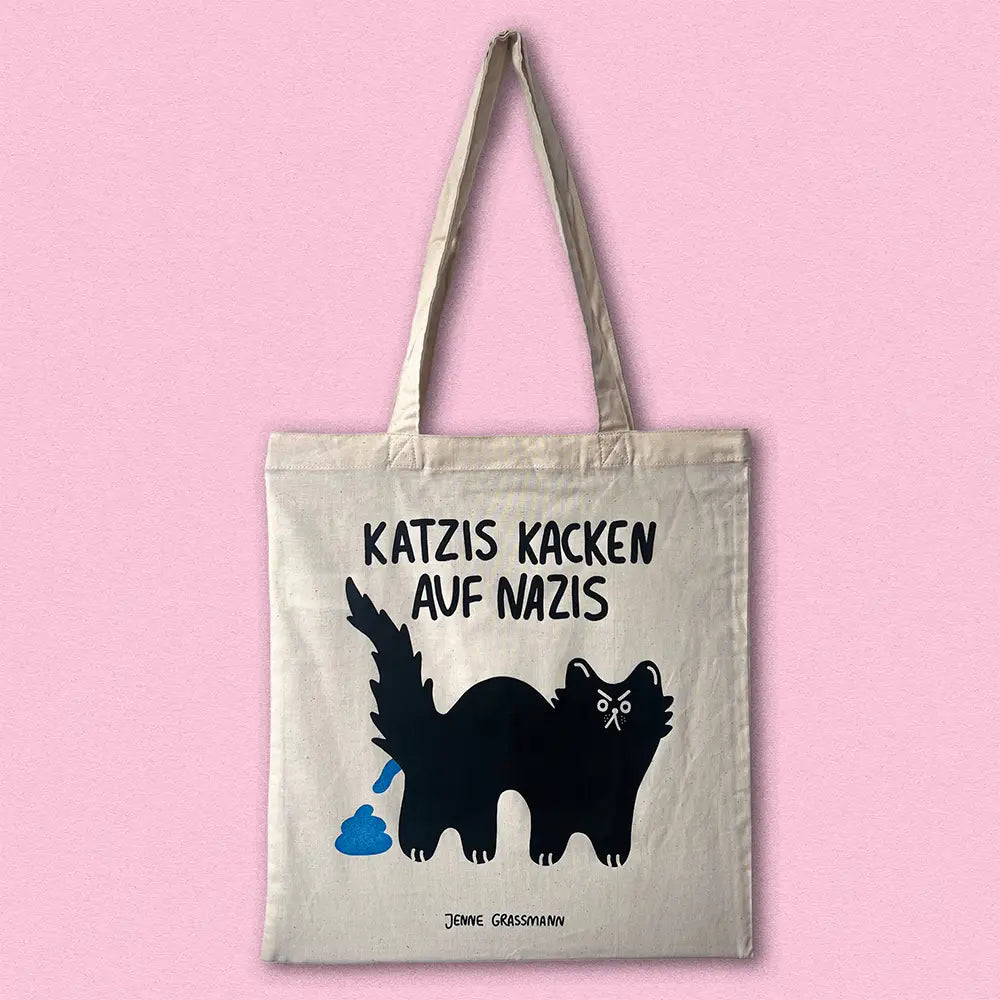 Tote Bag aus Bio-Baumwolle mit Illustration einer kackenden Katze, Schriftzug "Katzis kacken auf Nazis"